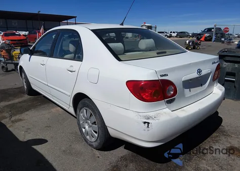 2003 Toyota Corolla Le z USA, uszkodzony, nr VIN JTDBR32E730017228